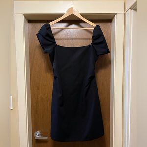 Black mini dress with puff sleeves